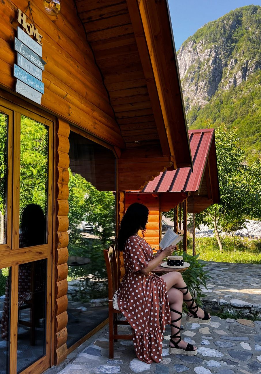 Travel author taking notes in a mountain library